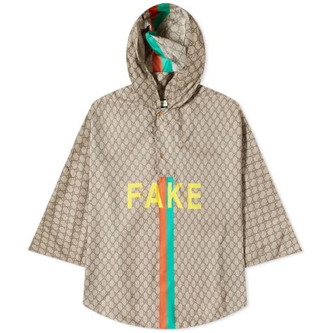 gucci not fake poncho|Gucci Fake Not Jacquard Nylon Poncho Beige & Multi .